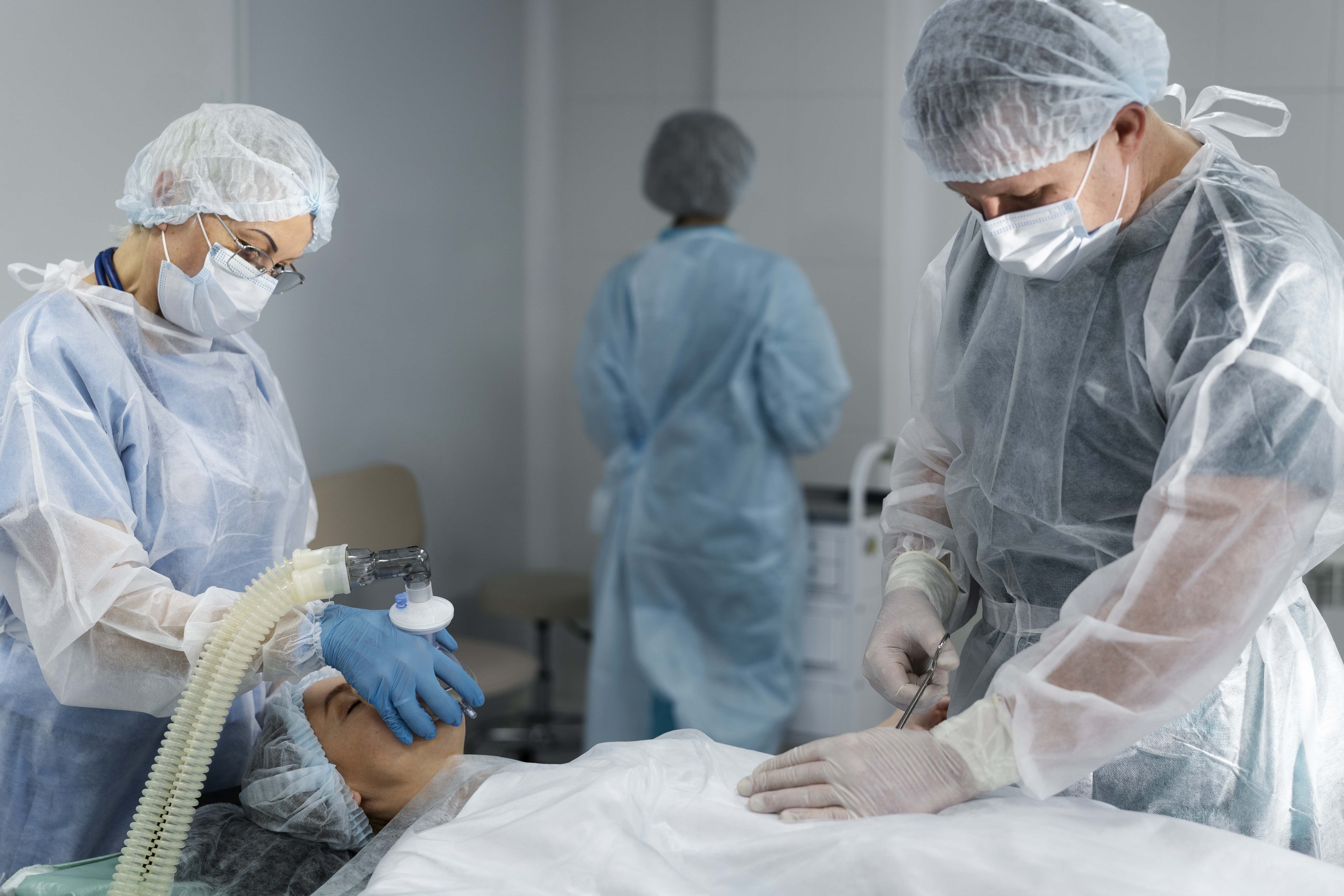 Critical care ICU doctors monitoring vital signs